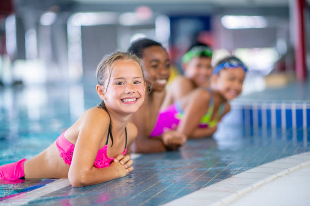 istock Friends at the pool 1321814782