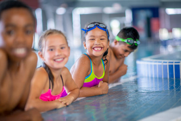 istock Friends at the pool 1321814788