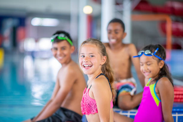 istock Friends at the pool 1321814800