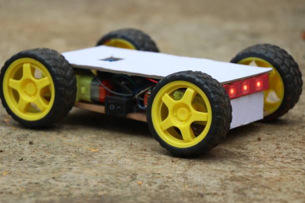 istock Mini car which is controlled by smart phone. robotics and electronics combine to form innovative project 1321823152