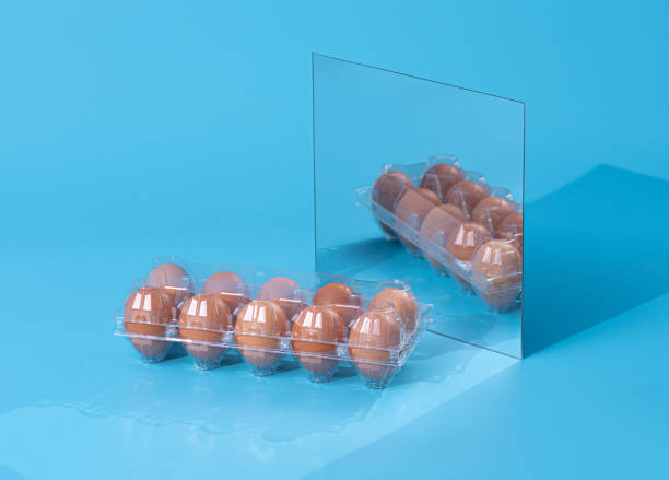 istock Fresh eggs in a box.Top view copy space,blue background. 1321838269
