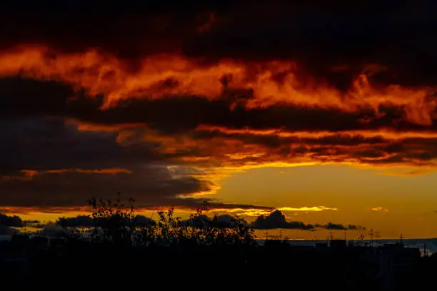 dramatic summer evening orange sky, bright colorful sunset