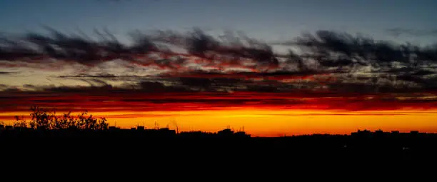 dramatic summer evening orange sky, bright colorful sunset, panoramic shot