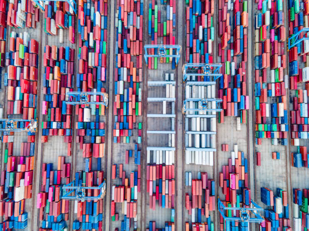 istock Aerial view container ship in the harbor 1321851937