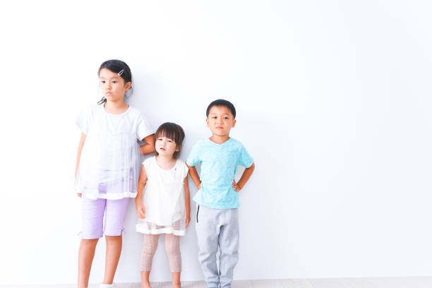 istock Children playing together with smiles 1321852536