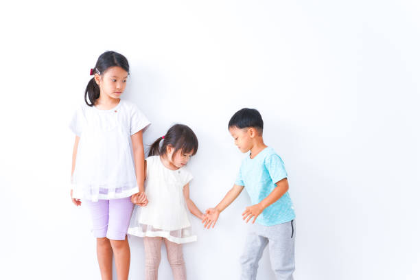 istock Children playing together with smiles 1321852537