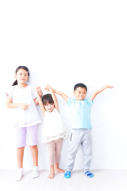 istock Children playing together with smiles 1321852540