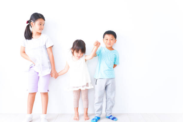 istock Children playing together with smiles 1321852541