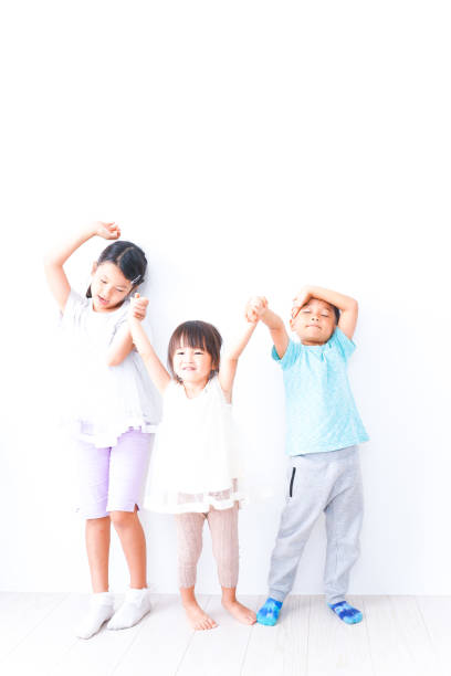 istock Children playing together with smiles 1321852543