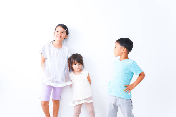 istock Children playing together with smiles 1321852544