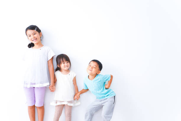 istock Children playing together with smiles 1321852546