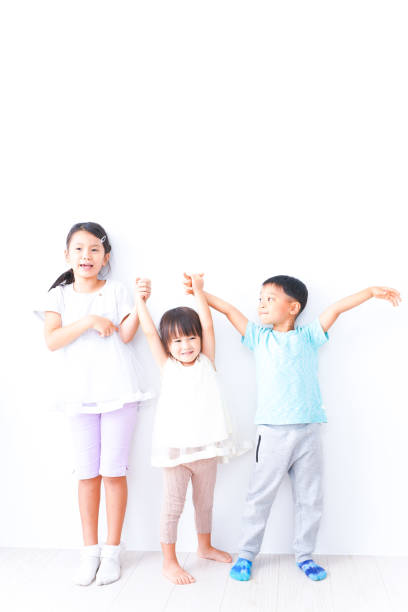 istock Children playing together with smiles 1321852547