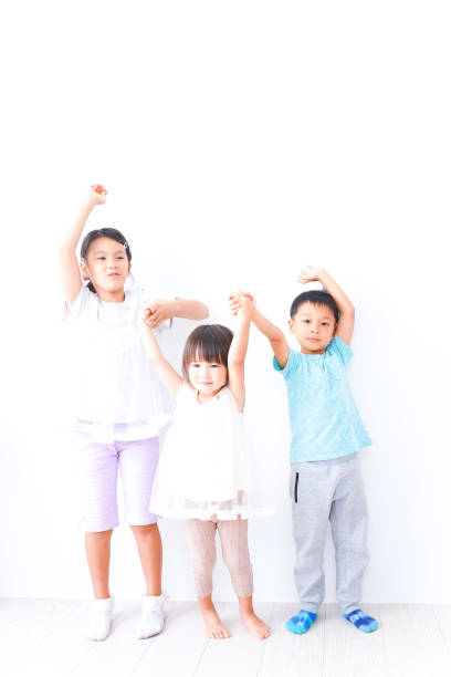 istock Children playing together with smiles 1321852550