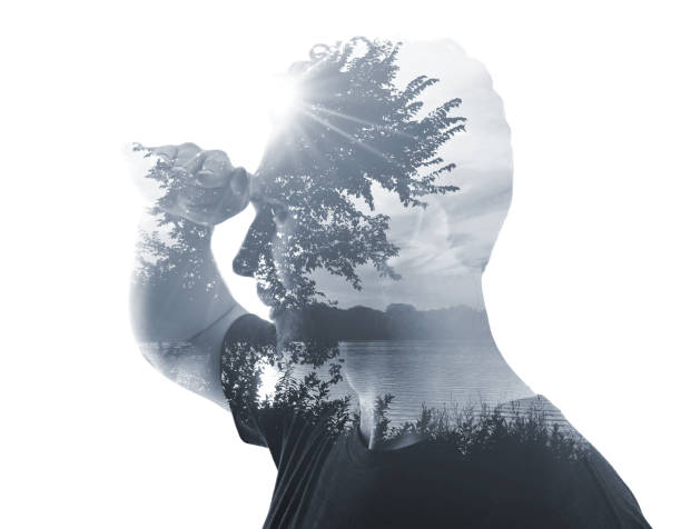 istock Multiple Exposure of young man and lake at sunset 1321855099