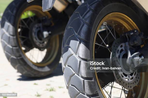 Two Rear Wheels Of A Motorcycle With Brake Discs Closeup Stock Photo - Download Image Now