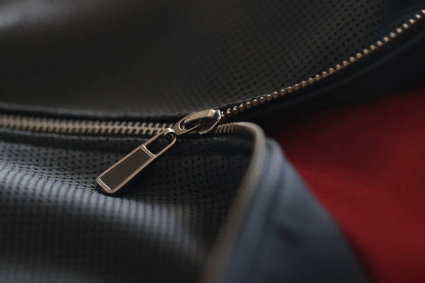High-quality handmade leather wallet on a workbench in a professional workshop.