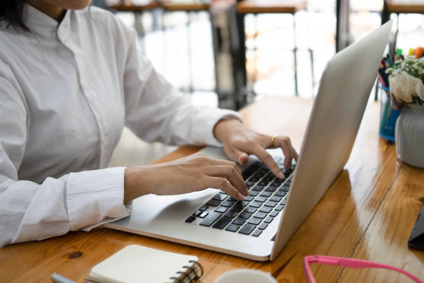 istock Cropped shot young woman hands typing on laptop computer. 1321863174