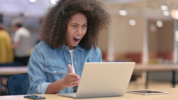 istock African Woman Upset by Loss at Work 1321866554