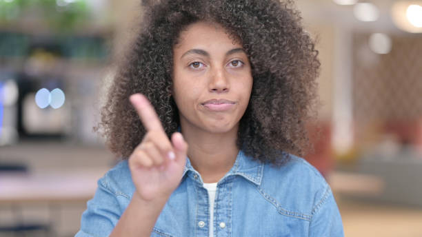 istock No by Rejecting African, Waving Finger 1321866913