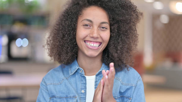 istock Applauding African Woman, Clapping 1321867107