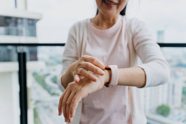 istock Senior woman wearing a smart watch 1321871856