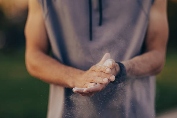 istock Unrecognizable Athlete Preparing his Hands with Powder 1321876910