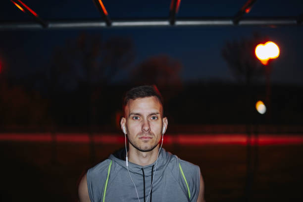 istock Handsome Tired Athlete Looking at Camera after Workout 1321876960