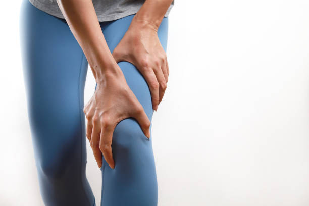 Woman Knee pain, leg pain stock photo
