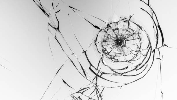 istock Cracks on the glass on a white background. 1321879902