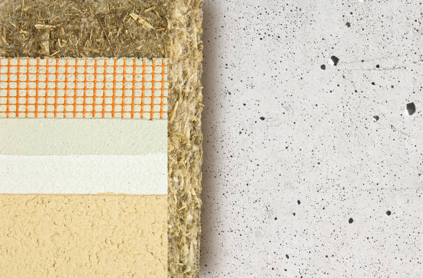 istock Thermal insulation coatings with hemp for building energy efficiency and reduce thermal losses against an old concrete wall - Building energy efficiency and savings concept image with copy space 1321880517