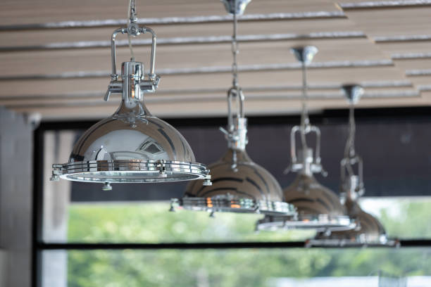 istock silver metal hanging lamp. chrome hanging lamp. 1321880585