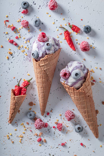 istock Spicy ice cream with berries and chilli. Strange icecream. 1321882275