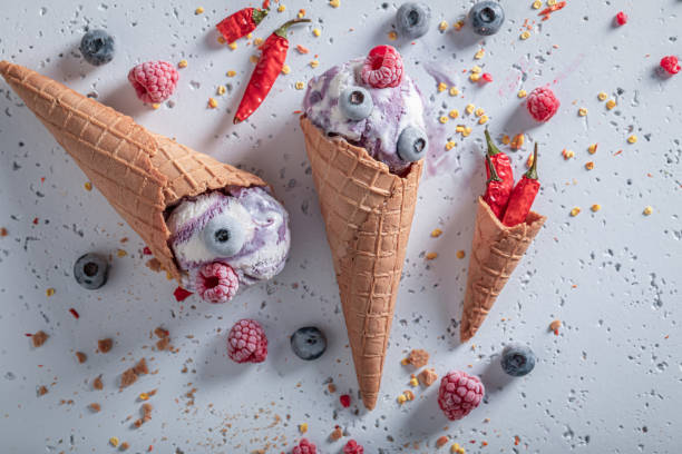 istock Fresh ice cream with berries and chilli. Strange icecream. 1321882781