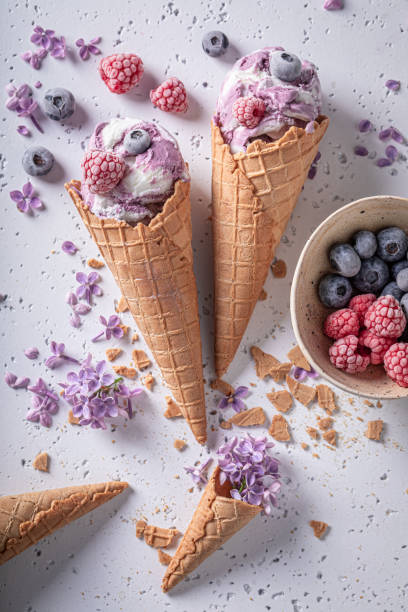 istock Sweet ice cream with blueberries. Ice cream in cone 1321882816