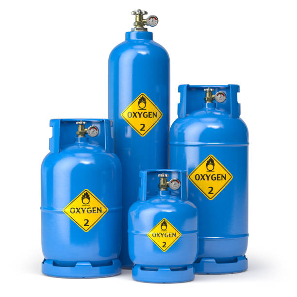 istock Oxygen gas tanks containers and cilinders of different size isolated on white. 1321883650