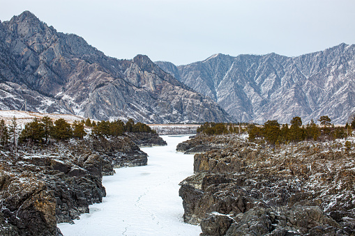 snow-covered river in the mountains Altai, Russia
