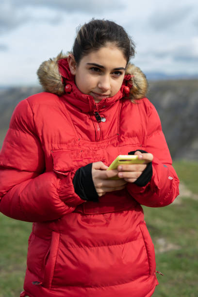 istock Girl hiker looking at the horizon 1321888462