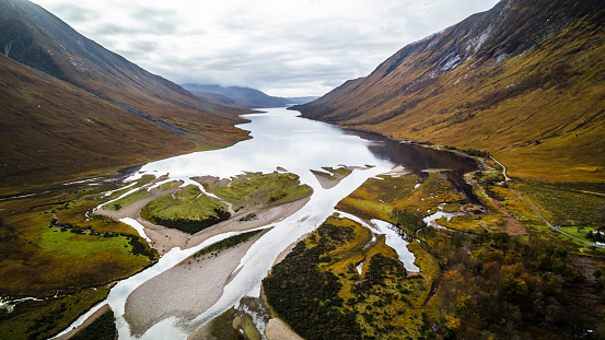 Aerial view of Etive river flowing into Loch Etive as a braided river.