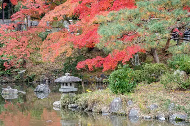 Stone lantern in the Maruyama park of Kyoto, Japan.
