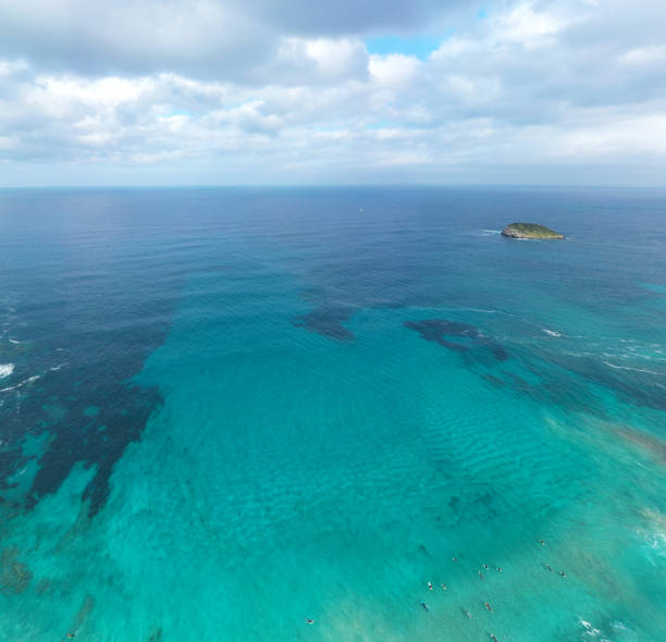 People surfing in amazing water - Cala Nova Ibiza
