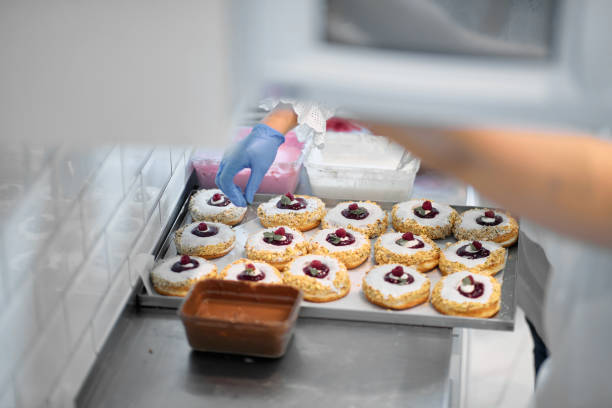 istock Closeup of donuts ready for transport 1321898599