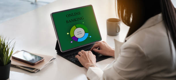 istock Business woman using digital tablet and using bank savings account application, account or saving money or insurance concept 1321899761