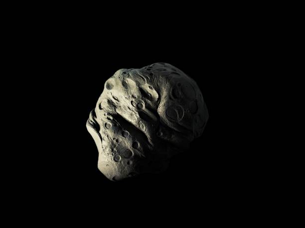 istock asteroid with craters on a black background, surface of the meteorite, cosmic stone. 1321902721