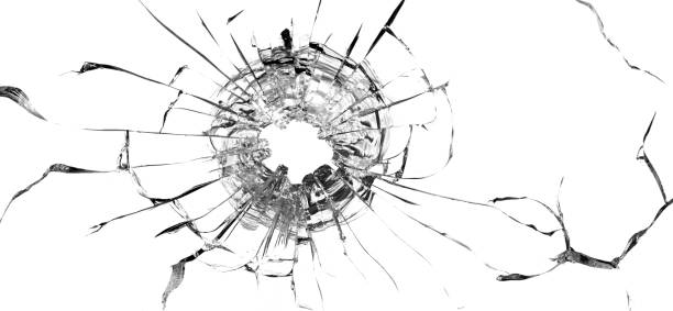 istock Bullet hole in the glass. Isolated on a white background. 1321902823