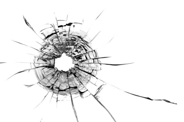 istock Bullet hole in the glass. Isolated on a white background. 1321902826
