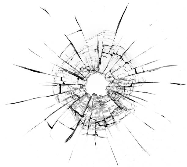 istock Bullet hole in the glass. Isolated on a white background. 1321902827