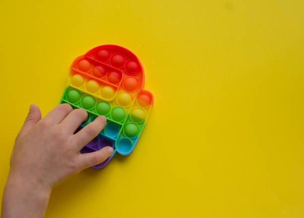 istock Multi-colored Silicone Anti-stress Toy for Motor Development Pop it 1321907649