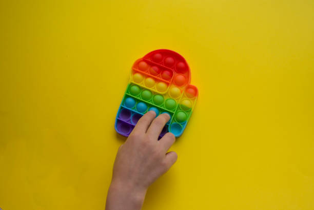 istock Multi-colored Silicone Anti-stress Toy for Motor Development Pop it 1321907658