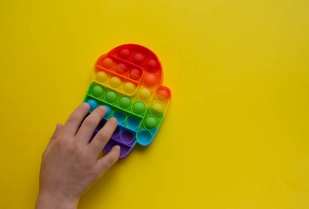 istock Multi-colored Silicone Anti-stress Toy for Motor Development Pop it 1321907661