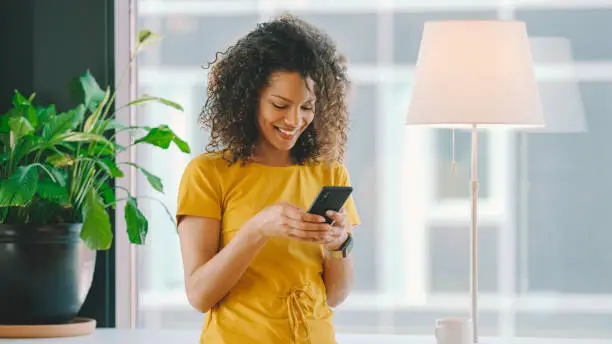 Mixed race businesswoman in coworking space